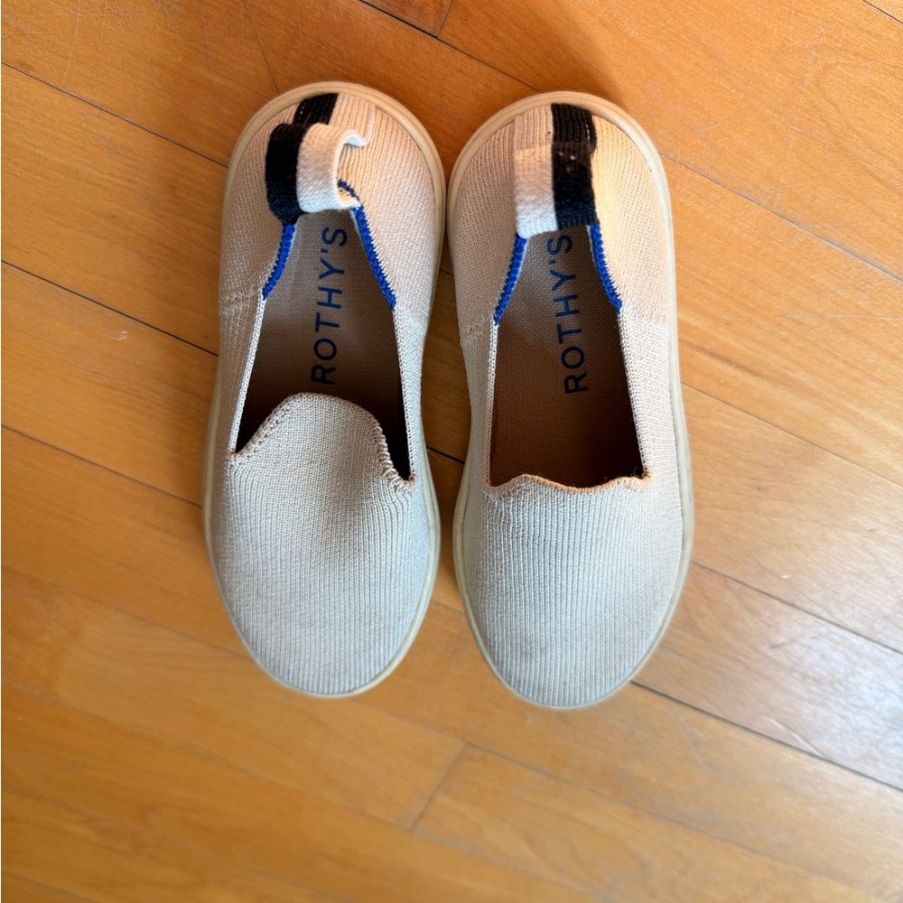 Rothy's Kids Slip-On Sneakers in Cream with Black and Blue Accents